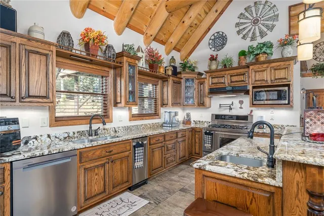 a view of a backyard with sitting area