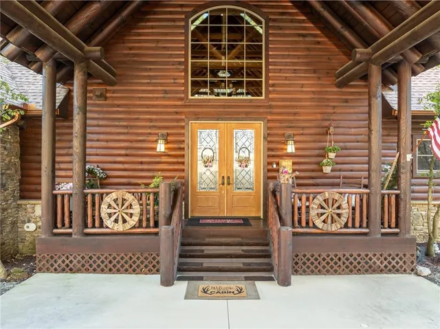 a view of a house with backyard and porch