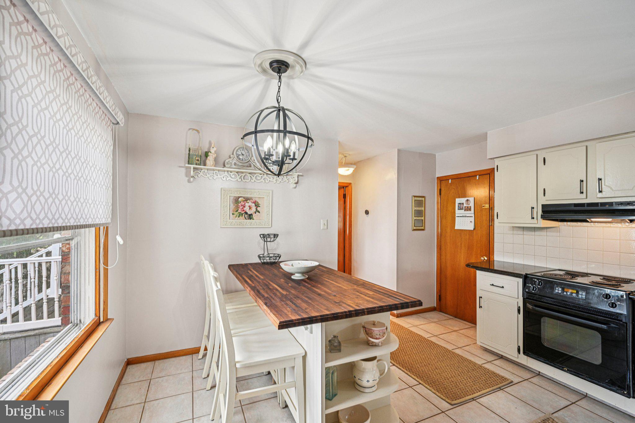 25618 Mt Pleasant Road Columbus, NJ 08022 - Photo 16 of 61 a kitchen with stainless steel appliances granite countertop a stove top oven a sink dishwasher and a refrigerator with wooden floor