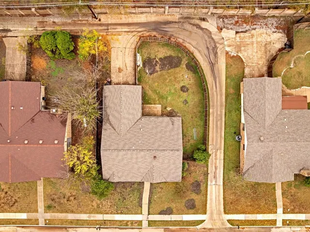 an aerial view of a city with lots of residential buildings
