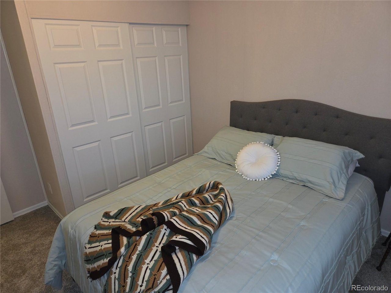 15296 39th Road Sterling, CO 80751 - Photo 28 of 31 a view of a bedroom with furniture