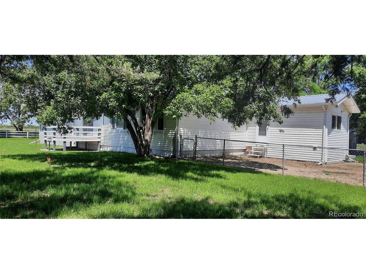 15296 39th Road Sterling, CO 80751 - Photo 7 of 31 a view of a backyard