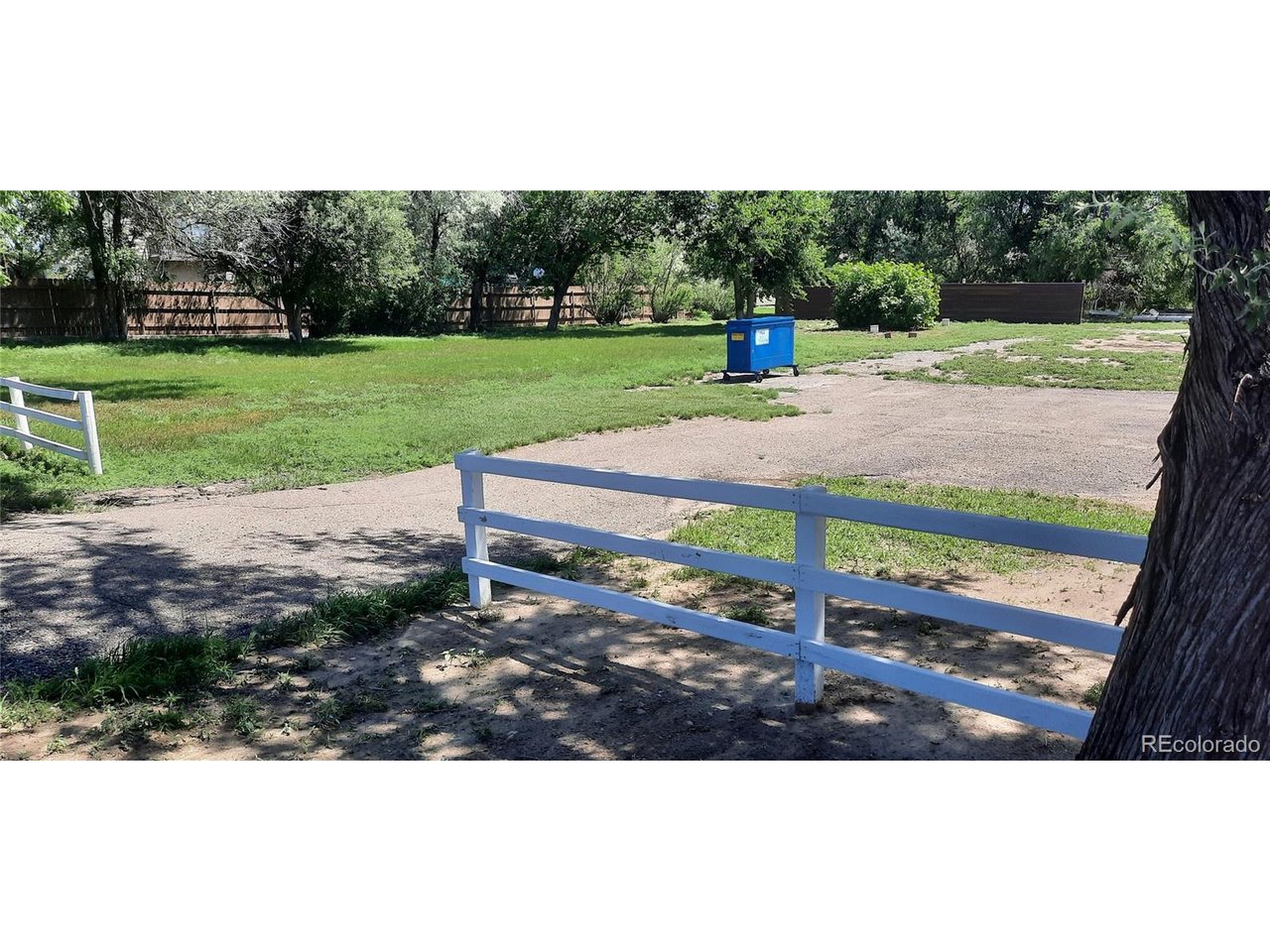 15296 39th Road Sterling, CO 80751 - Photo 10 of 31 a view of a park with large trees