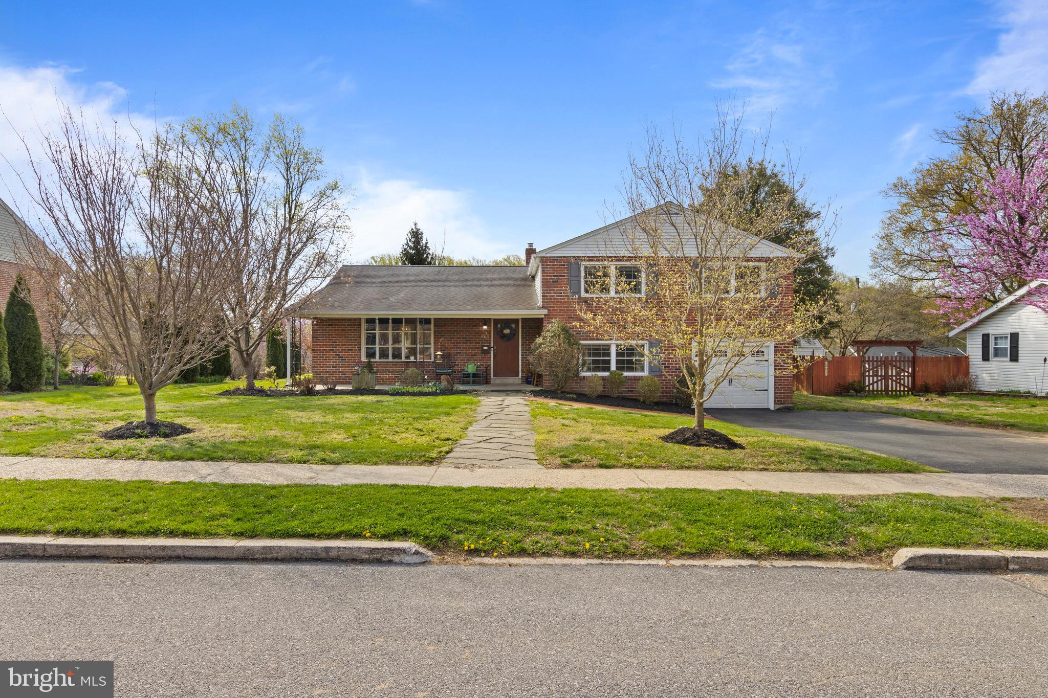 502 Ridge Avenue Kennett Square, PA 19348 - Photo 1 of 60 a view of a house with a big yard plants and large trees
