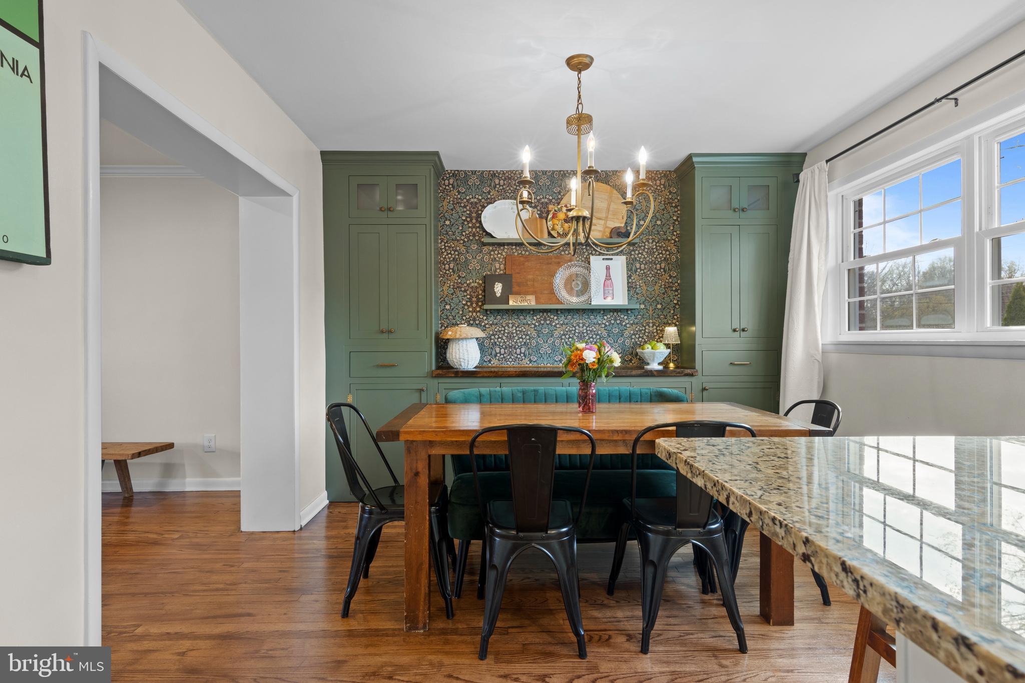 502 Ridge Avenue Kennett Square, PA 19348 - Photo 17 of 60 a view of a dining room with furniture and chandelier