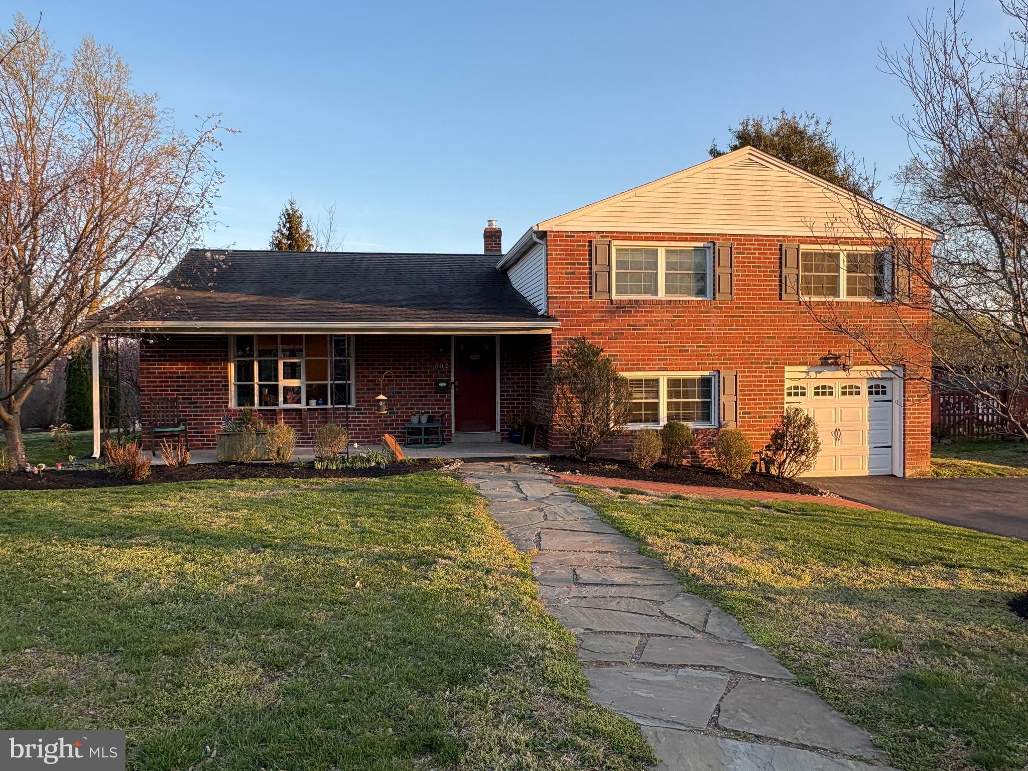 502 Ridge Avenue Kennett Square, PA 19348 - Photo 2 of 60 a front view of a house with a yard