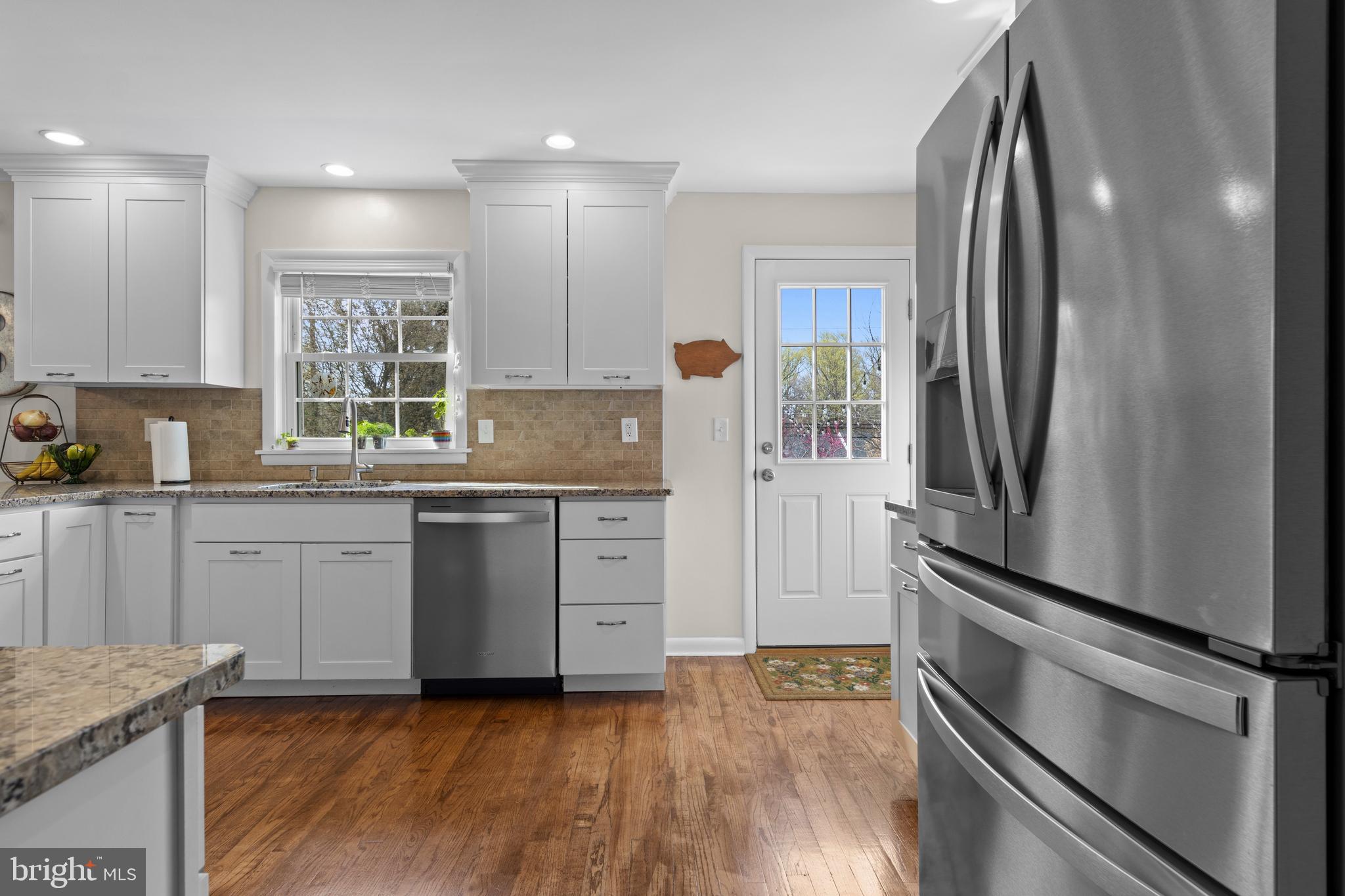 502 Ridge Avenue Kennett Square, PA 19348 - Photo 22 of 60 a kitchen with granite countertop stainless steel appliances and counter space