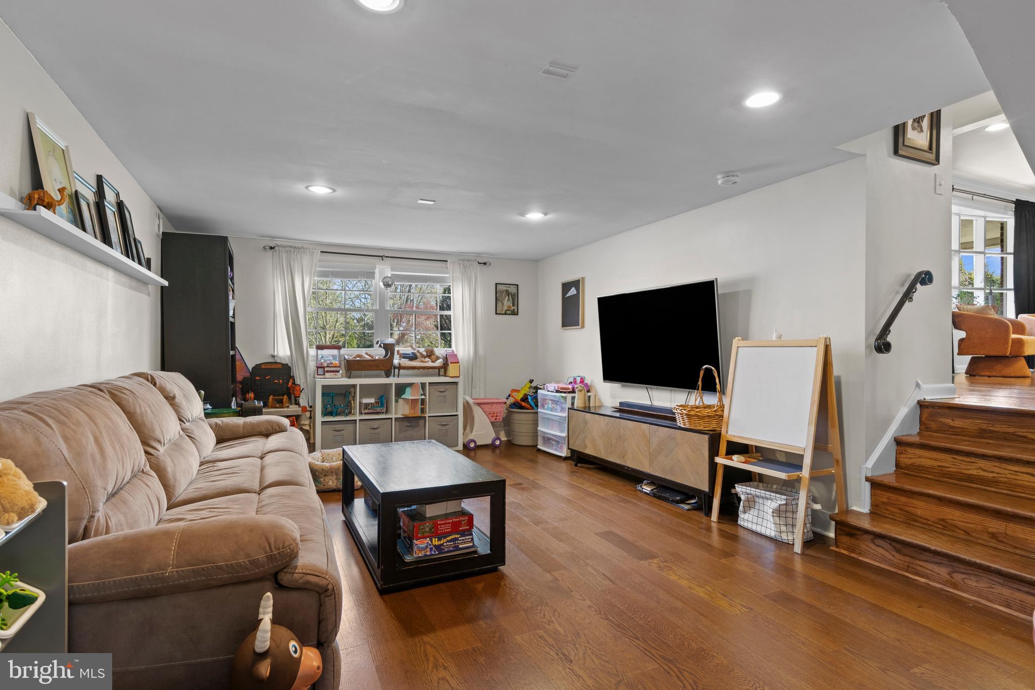 502 Ridge Avenue Kennett Square, PA 19348 - Photo 42 of 60 a living room with furniture and a flat screen tv