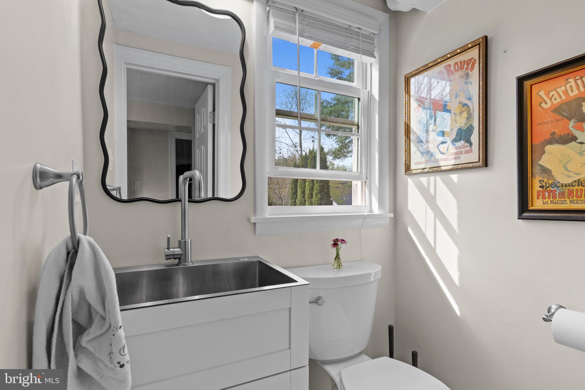 502 Ridge Avenue Kennett Square, PA 19348 - Photo 47 of 60 a bathroom with a sink and a mirror