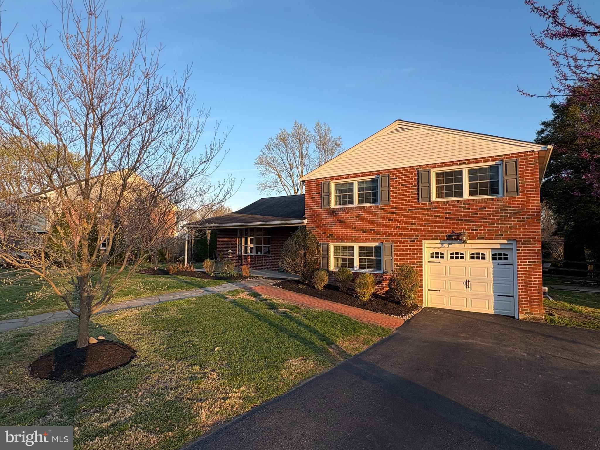 502 Ridge Avenue Kennett Square, PA 19348 - Photo 5 of 60 a front view of a house with a yard