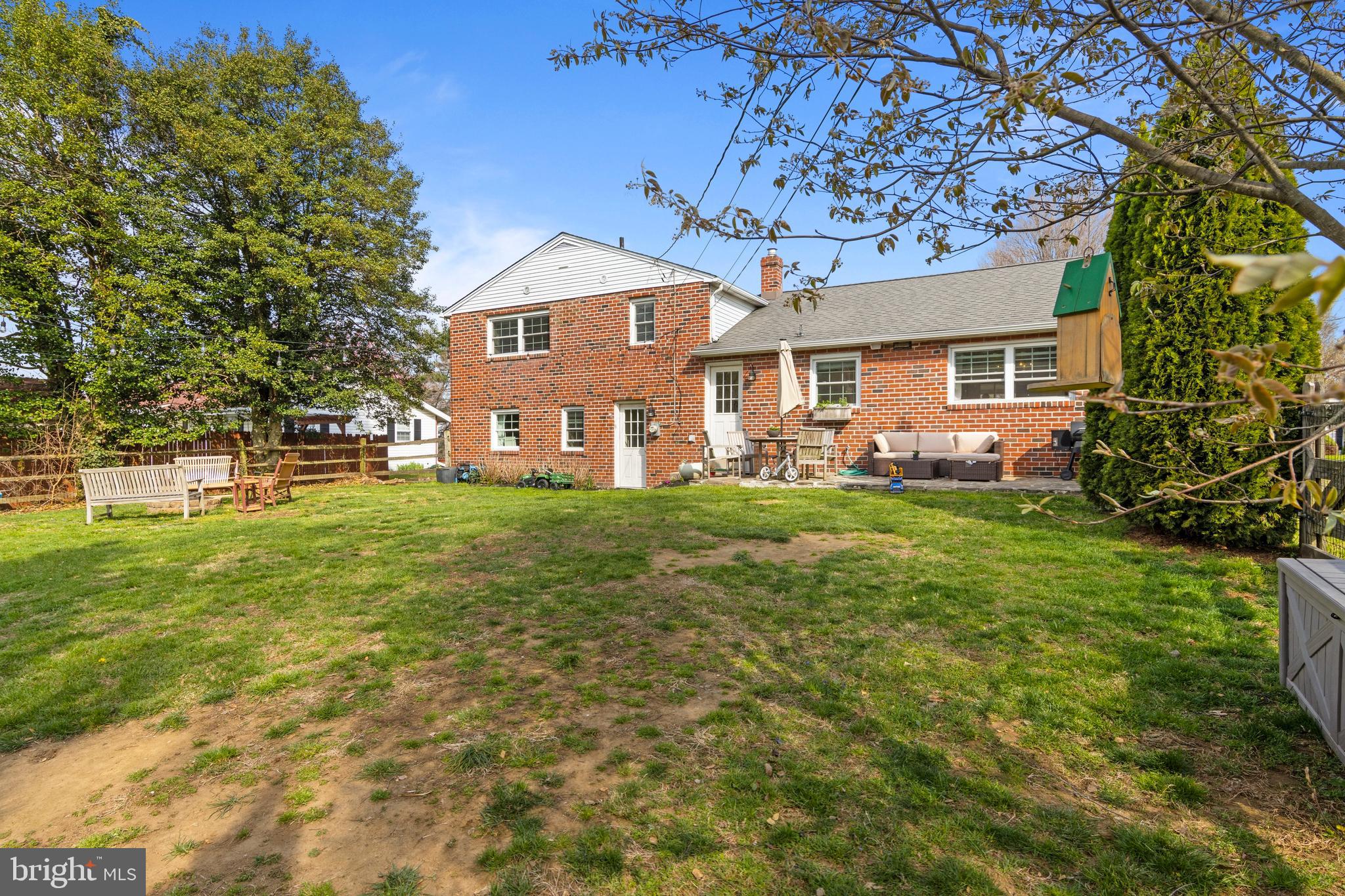 502 Ridge Avenue Kennett Square, PA 19348 - Photo 52 of 60 a front view of a house with a yard and trees