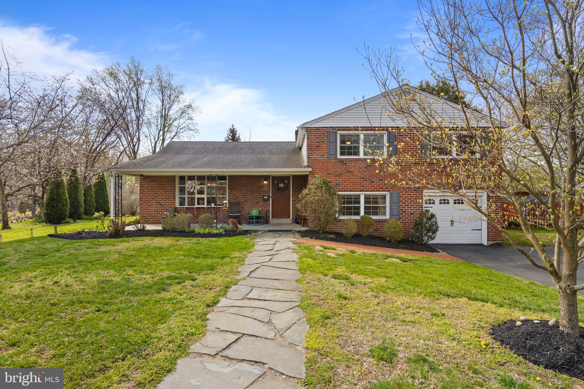 502 Ridge Avenue Kennett Square, PA 19348 - Photo 58 of 60 a front view of a house with a yard