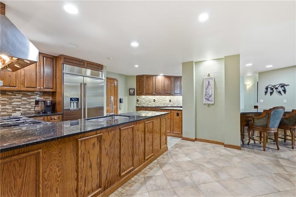 265 McFann Road Valencia, PA 16059 - Photo 21 of 50 a large kitchen with stainless steel appliances a sink and cabinets