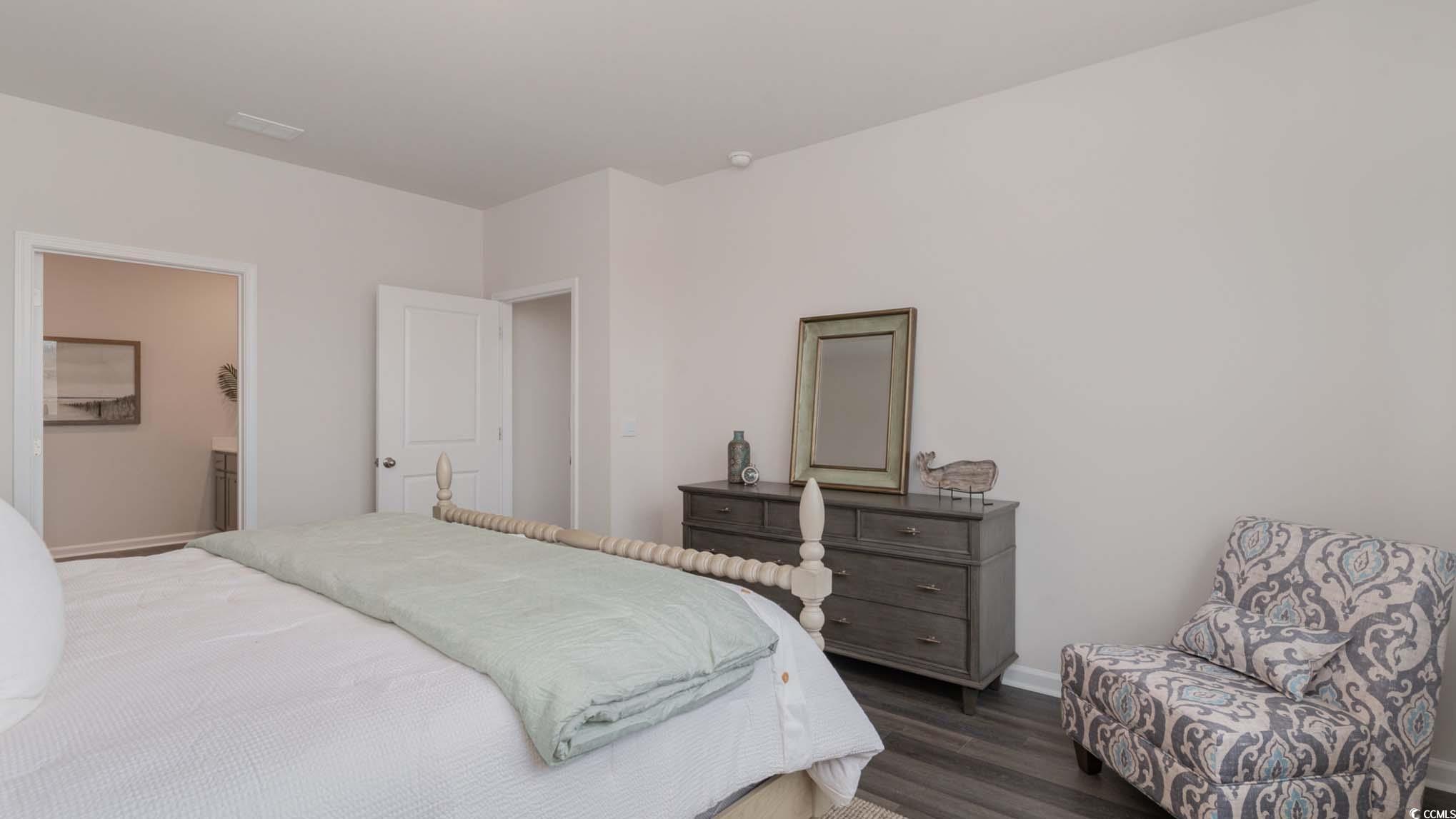 2844 Riverboat Way Conway, SC 29526 - Photo 13 of 24 Bedroom with dark hardwood / wood-style flooring