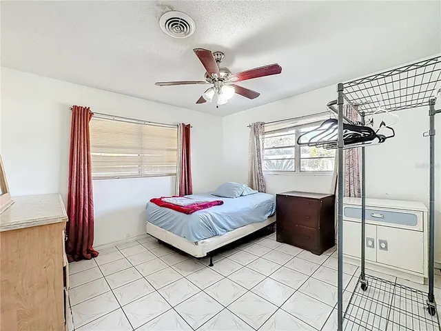 a living room with furniture and window
