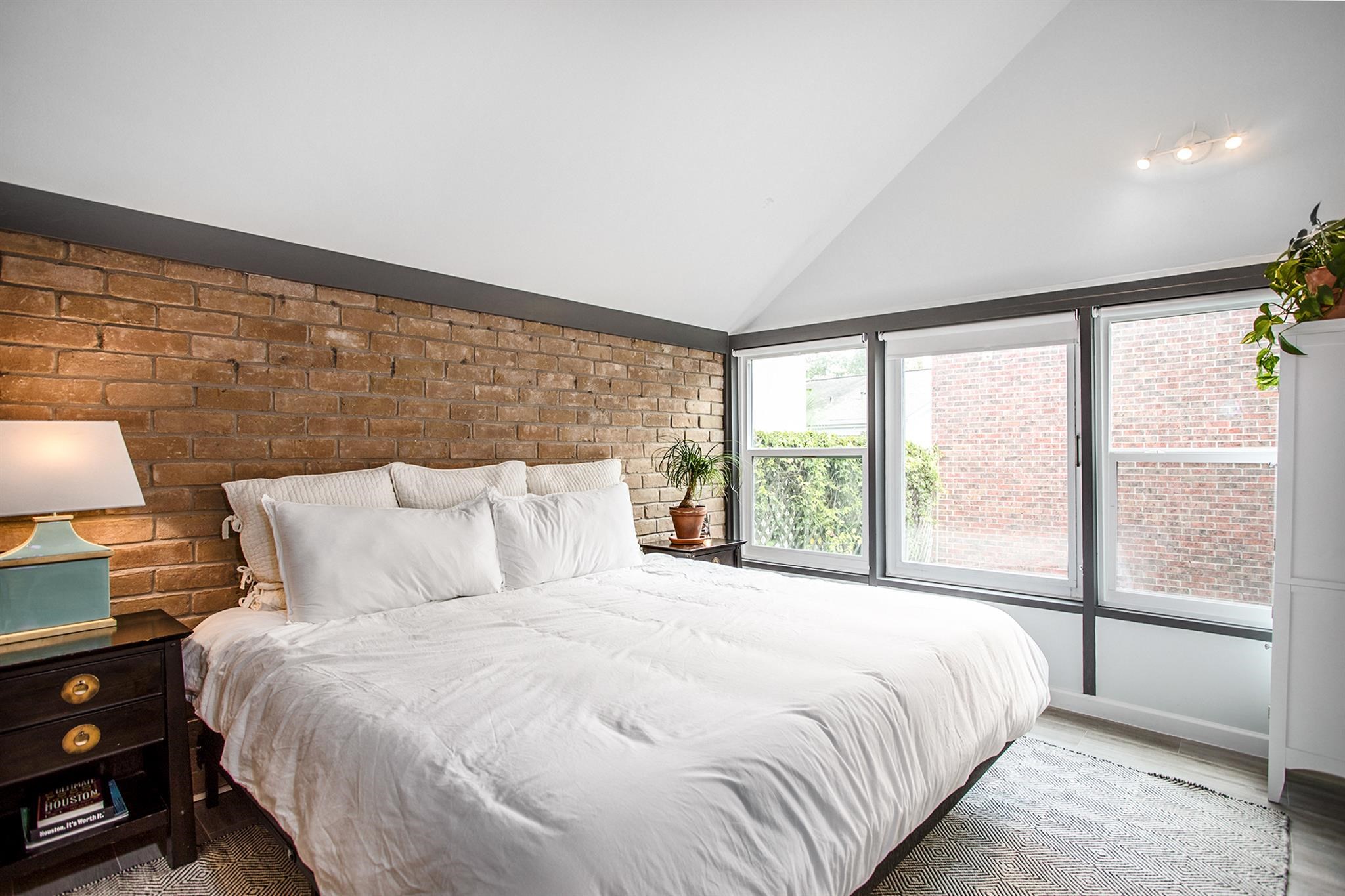 1942 Indiana Street Houston, TX 77019 - Photo 14 of 40 Plenty of room for a large bed and extra furniture in this secondary bedroom.