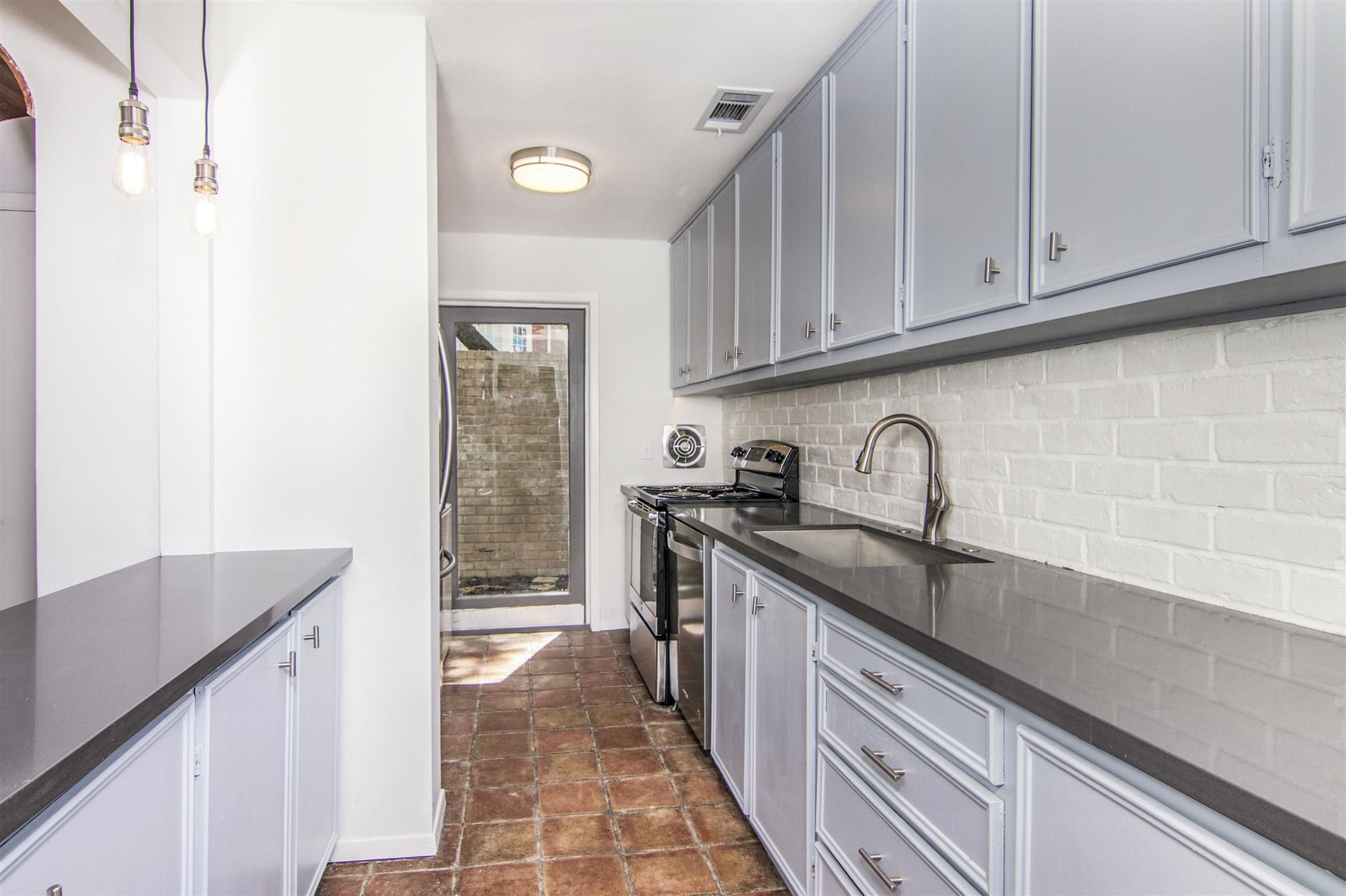 1942 Indiana Street Houston, TX 77019 - Photo 26 of 40 There's an abundance of storage in this kitchen.