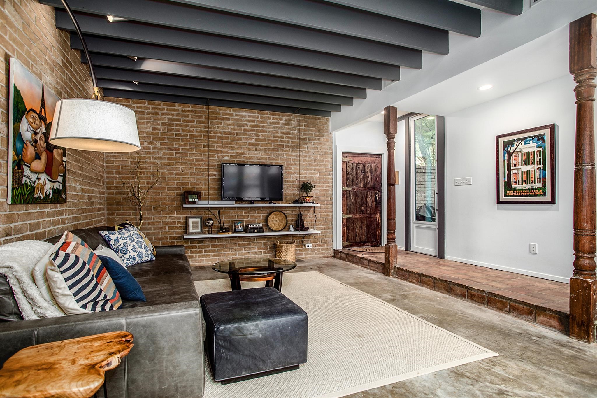 1942 Indiana Street Houston, TX 77019 - Photo 3 of 40 a living room with furniture and a flat screen tv