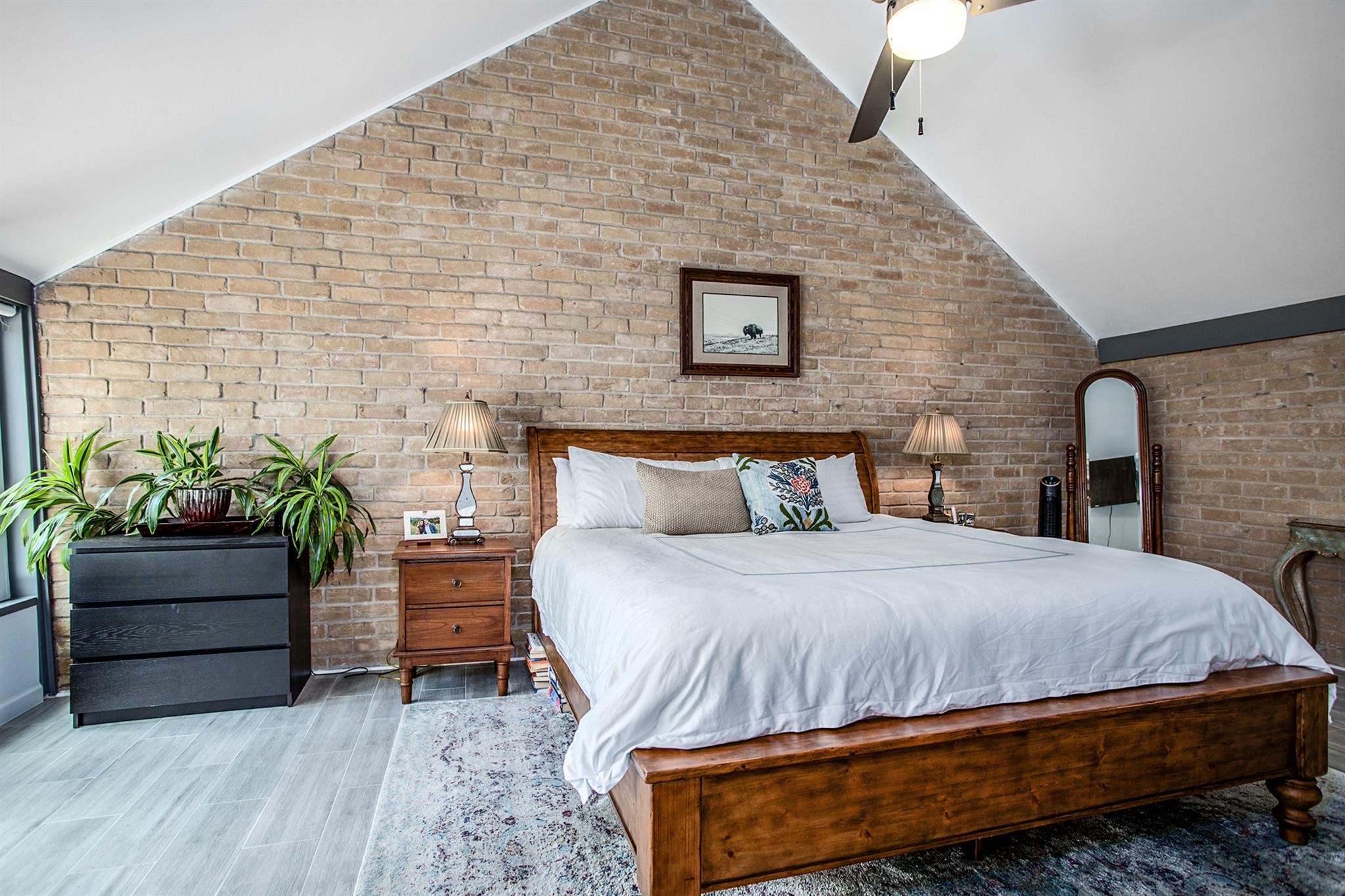 1942 Indiana Street Houston, TX 77019 - Photo 32 of 40 Another view of the primary bedroom - plenty of space for a king-sized bed and additional bedroom furniture.