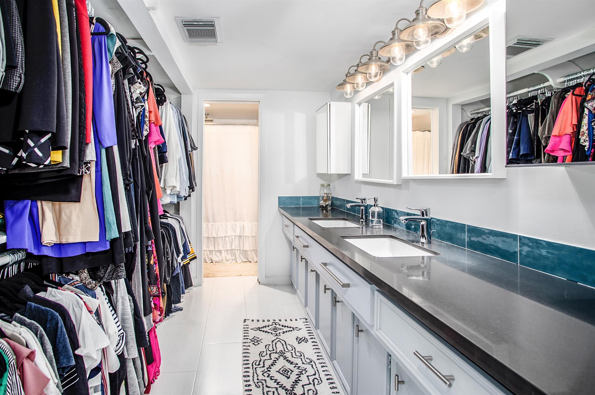 1942 Indiana Street Houston, TX 77019 - Photo 35 of 40 There's no shortage of counter space and storage in this bathroom.