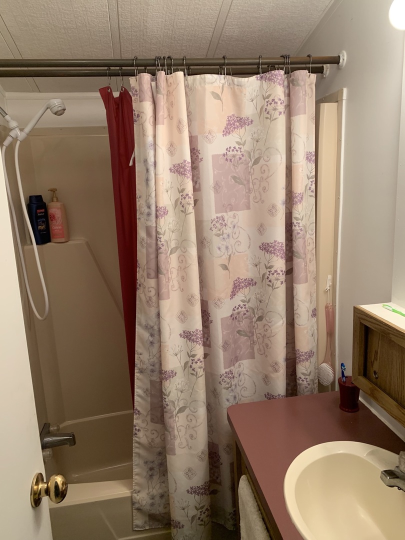 5-125 Woodhaven Sublette, IL 61367 - Photo 19 of 19 a bathroom with a sink and a shower