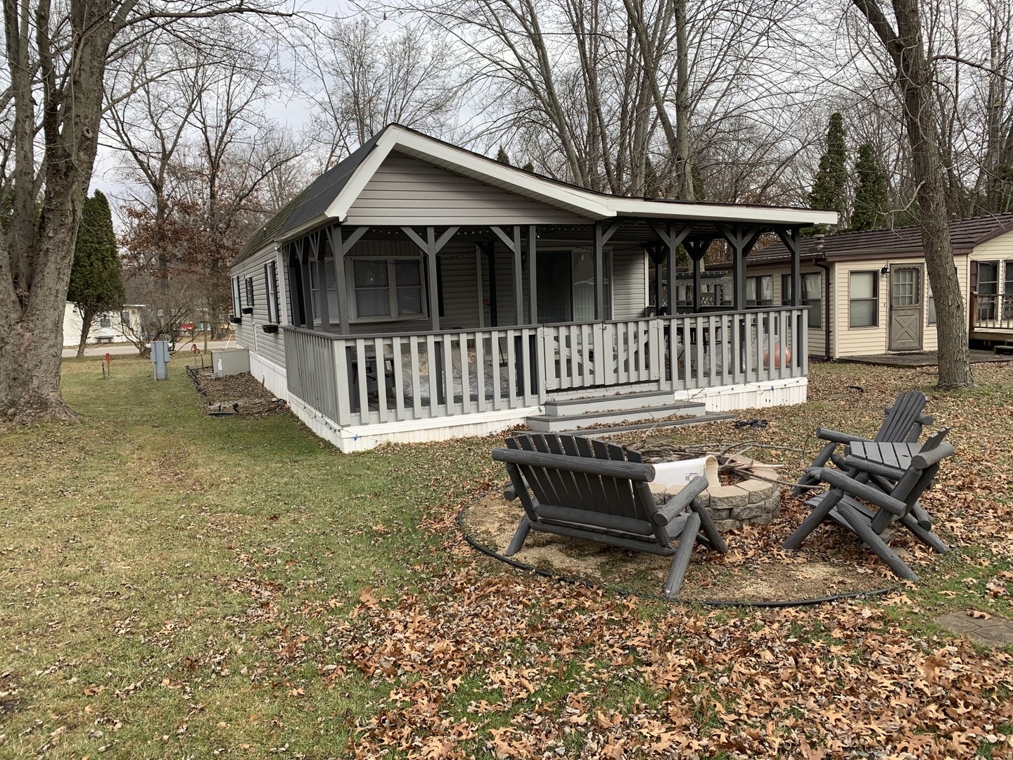 5-125 Woodhaven Sublette, IL 61367 - Photo 5 of 19 a view of a house with a yard and wooden fence
