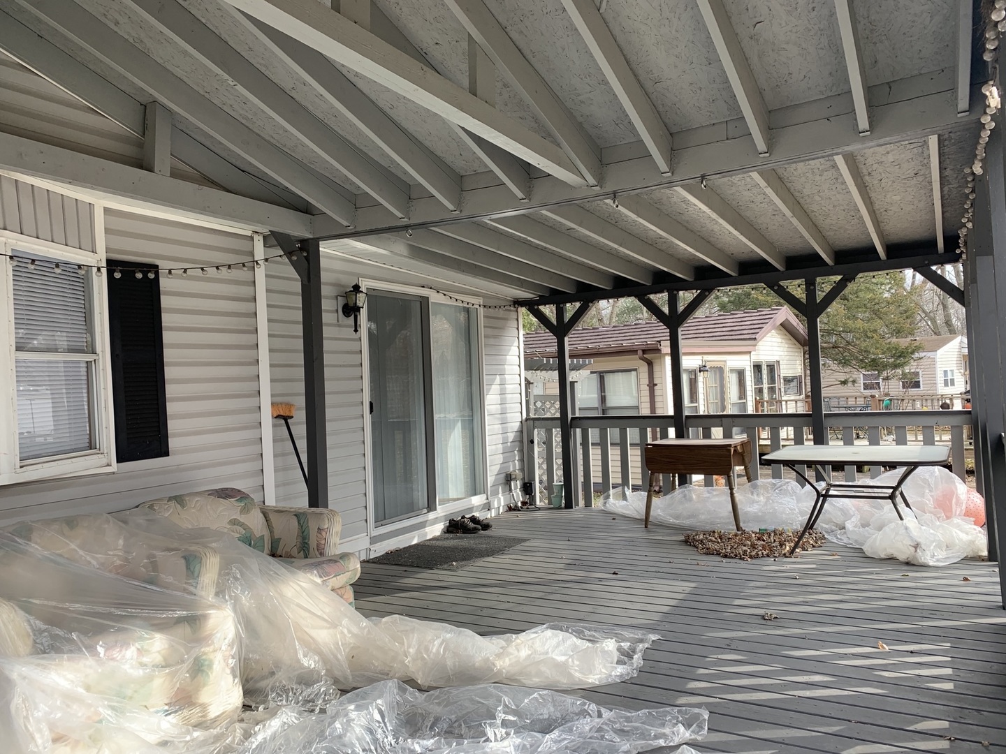 5-125 Woodhaven Sublette, IL 61367 - Photo 7 of 19 a view of a porch with furniture and a yard