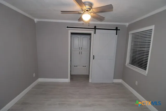 a bathroom with a shower and a tub
