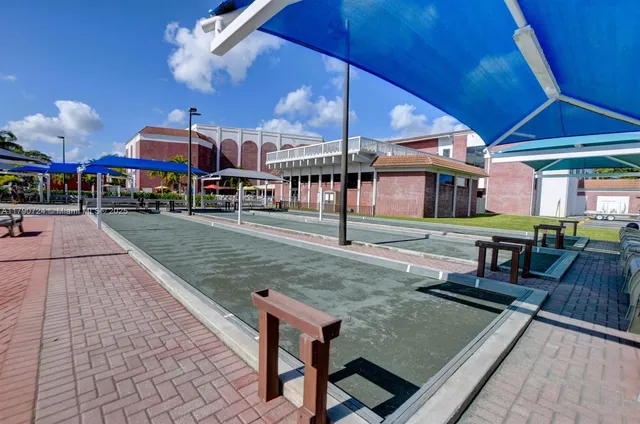 a view of a dining room with lots of tables and chairs