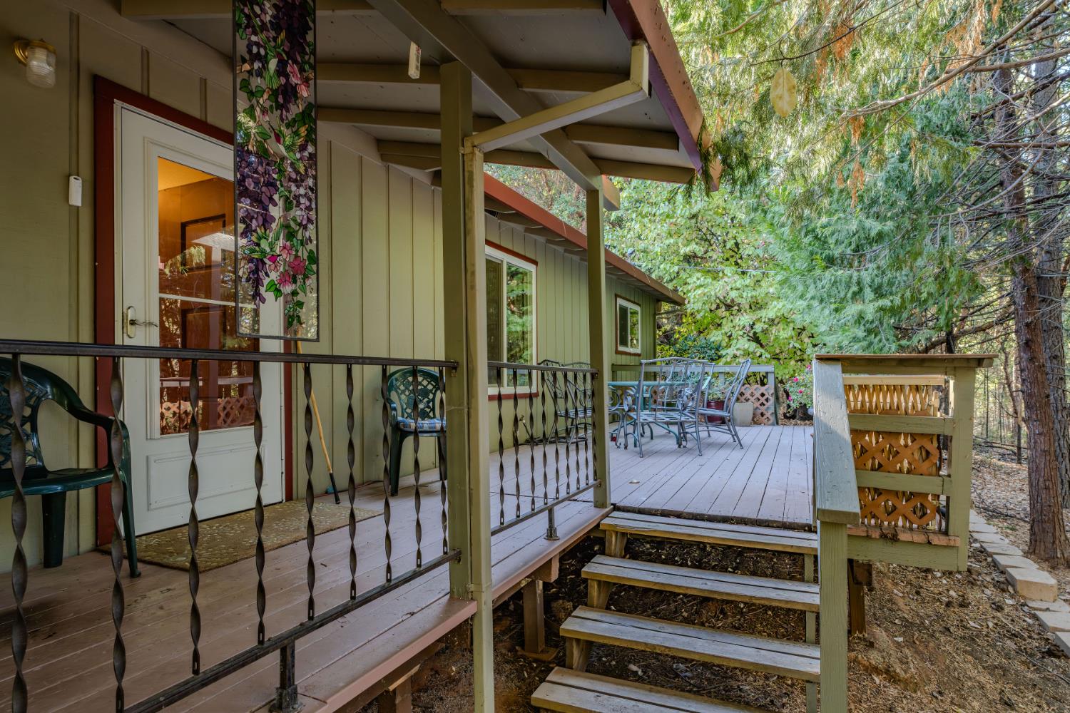 23420 Robin Road Pioneer, CA 95666 - Photo 12 of 43 a backyard of a house with wooden floor and outdoor seating