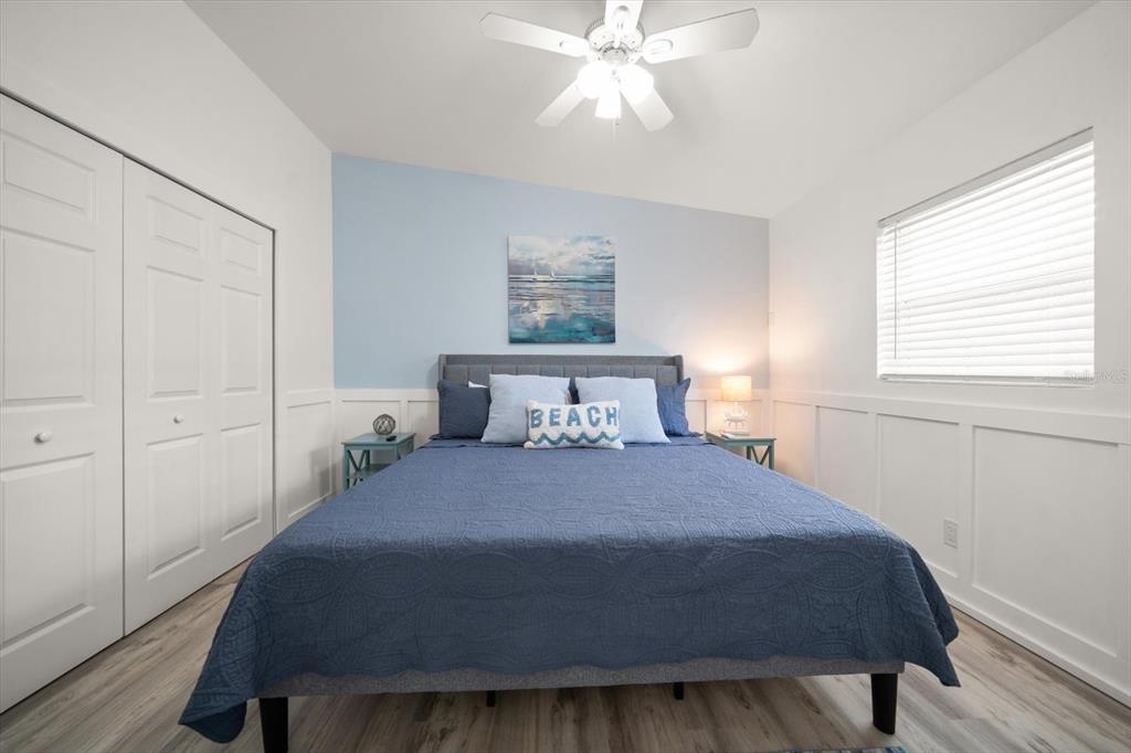 711 East Gulf Boulevard Indian Rocks Beach, FL 33785 - Photo 12 of 35 a bedroom with a bed and window