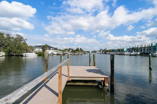 a view of a swimming pool with a lounge chair