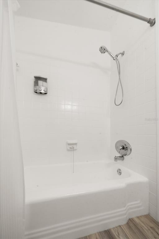 711 East Gulf Boulevard Indian Rocks Beach, FL 33785 - Photo 26 of 35 a bathroom with a bathtub