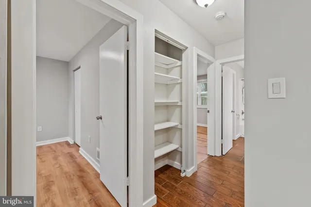 a view of a bedroom from a hallway