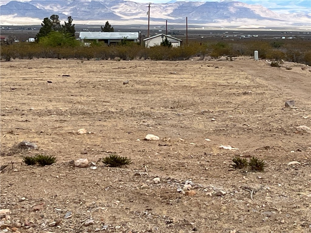 0 South Escuela (024) Road Golden Valley, AZ 86413 - Photo 1 of 6 View of lot with a mountain view