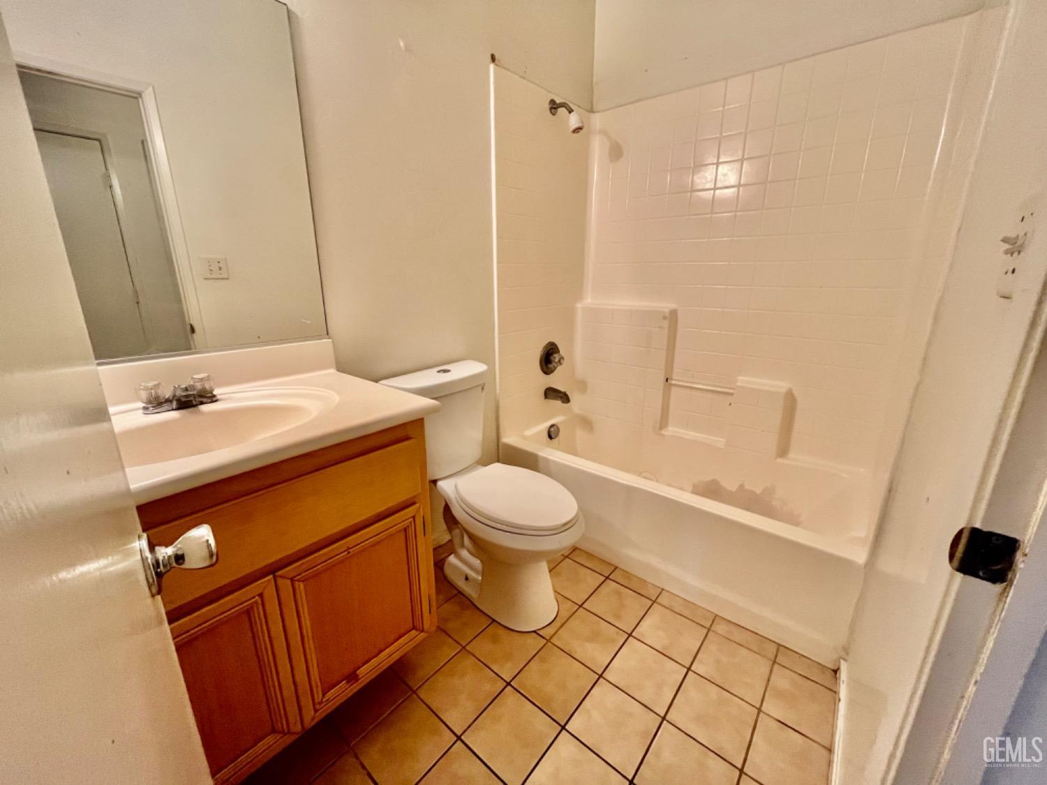 Undisclosed Address Arvin, CA 93203 - Photo 5 of 5 a bathroom with a sink a toilet a mirror and shower