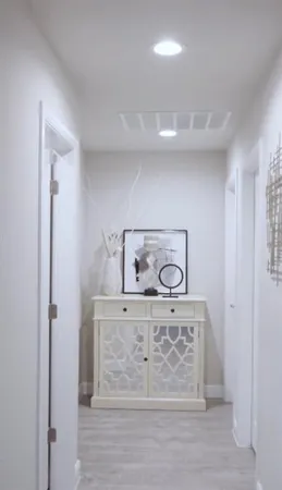 a bedroom with bed and window