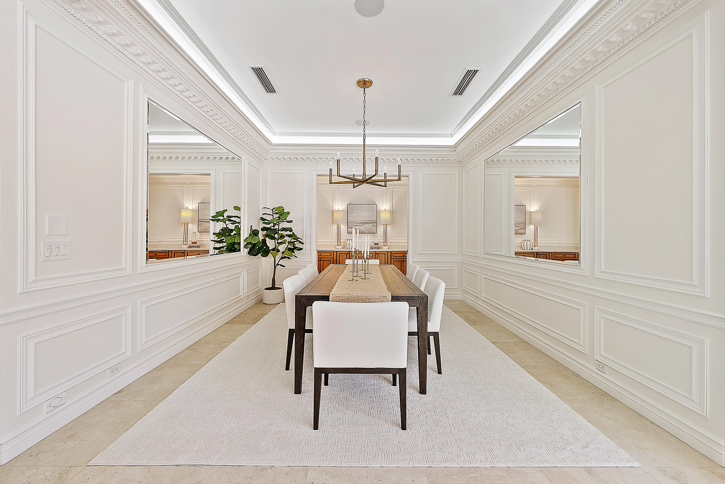314 Chilean Avenue Palm Beach, FL 33480 - Photo 11 of 46 a dining room with wooden floor and a chandelier