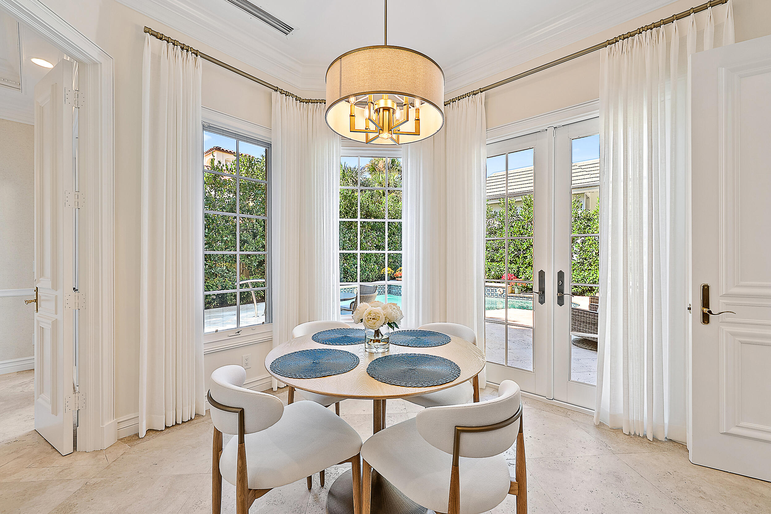 314 Chilean Avenue Palm Beach, FL 33480 - Photo 16 of 46 a view of a dining room with furniture window and outside view