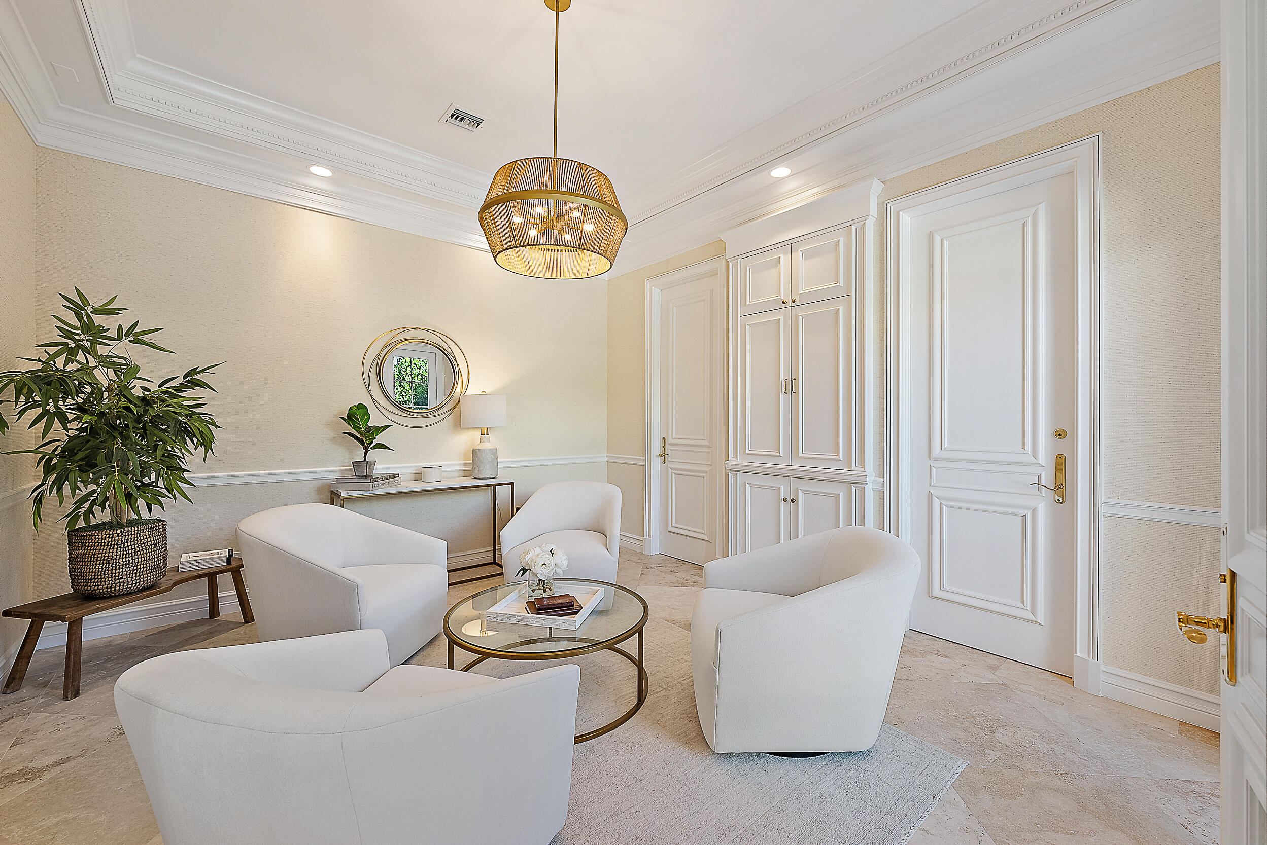 314 Chilean Avenue Palm Beach, FL 33480 - Photo 17 of 46 a living room with furniture a dining table and a chandelier