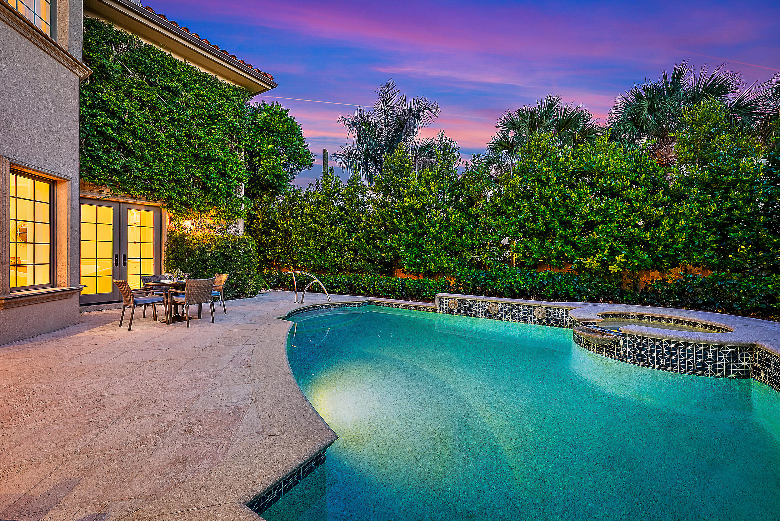314 Chilean Avenue Palm Beach, FL 33480 - Photo 3 of 46 a swimming pool with outdoor seating and yard