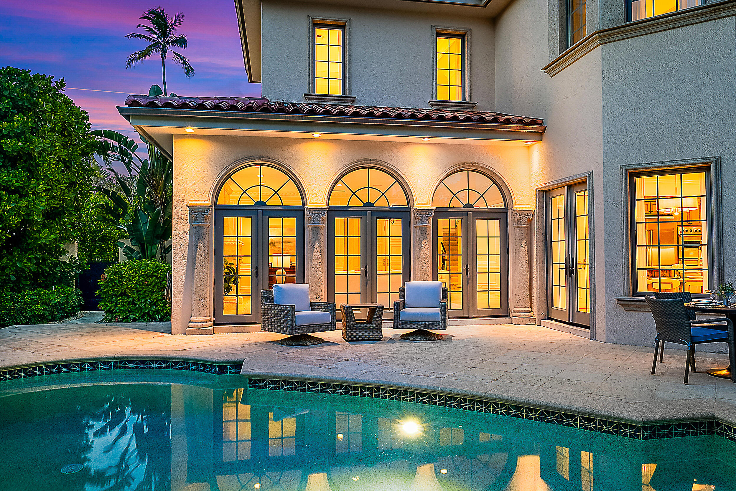 314 Chilean Avenue Palm Beach, FL 33480 - Photo 4 of 46 a view of swimming pool with outdoor seating and a potted plant