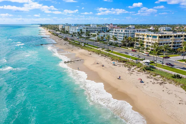 a view of a city with an ocean beach