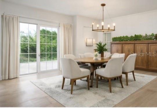 2352 Lorena Lane Clearwater, FL 33765 - Photo 5 of 5 a view of a dining room with furniture window and outside view