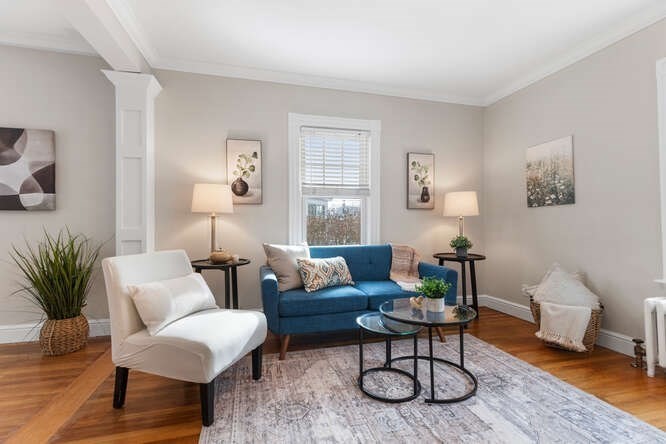 15 Maple Street Melrose, MA 02176 - Photo 11 of 38 a living room with furniture and a rug