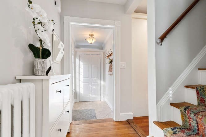 15 Maple Street Melrose, MA 02176 - Photo 3 of 38 a view of front door and bedroom
