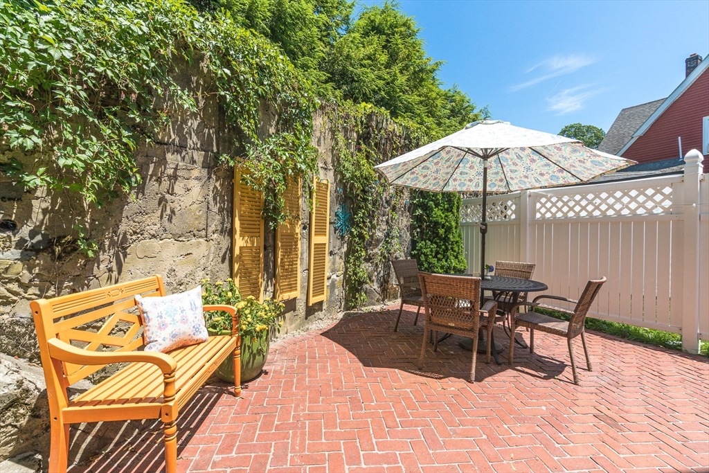 15 Maple Street Melrose, MA 02176 - Photo 31 of 38 a view of outdoor space yard deck patio and outdoor kitchen