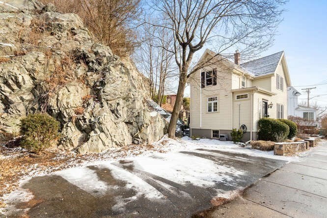 15 Maple Street Melrose, MA 02176 - Photo 36 of 38 a view of road with a white house