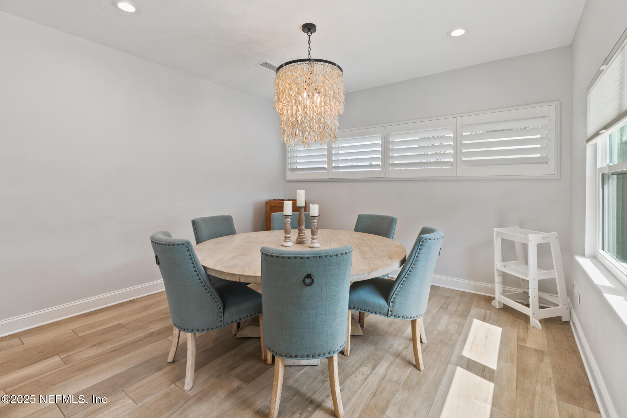 2341 Fiddlers Lane Atlantic Beach, FL 32233 - Photo 24 of 87 a view of a dining room with furniture window and wooden floor