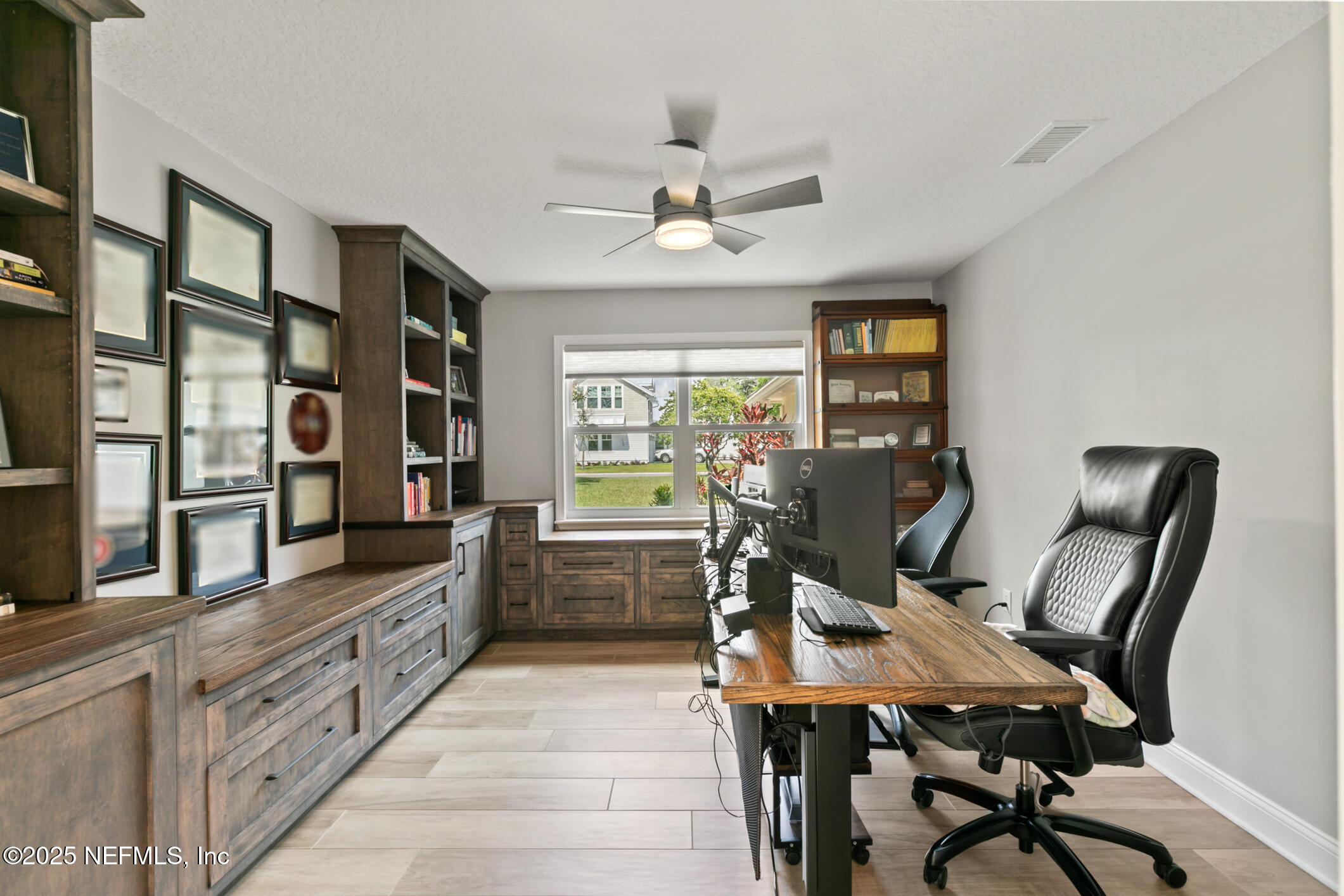 2341 Fiddlers Lane Atlantic Beach, FL 32233 - Photo 28 of 87 a view of a workspace with furniture and a window